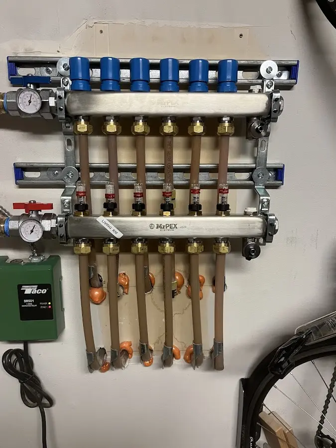 Plumber performing Water Heater Repair at a residential property in North Beaver